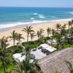 Cham Beach Bar sits right on the shore, offering panoramic views of Cù Lao Chàm (Cham Islands) in the distance