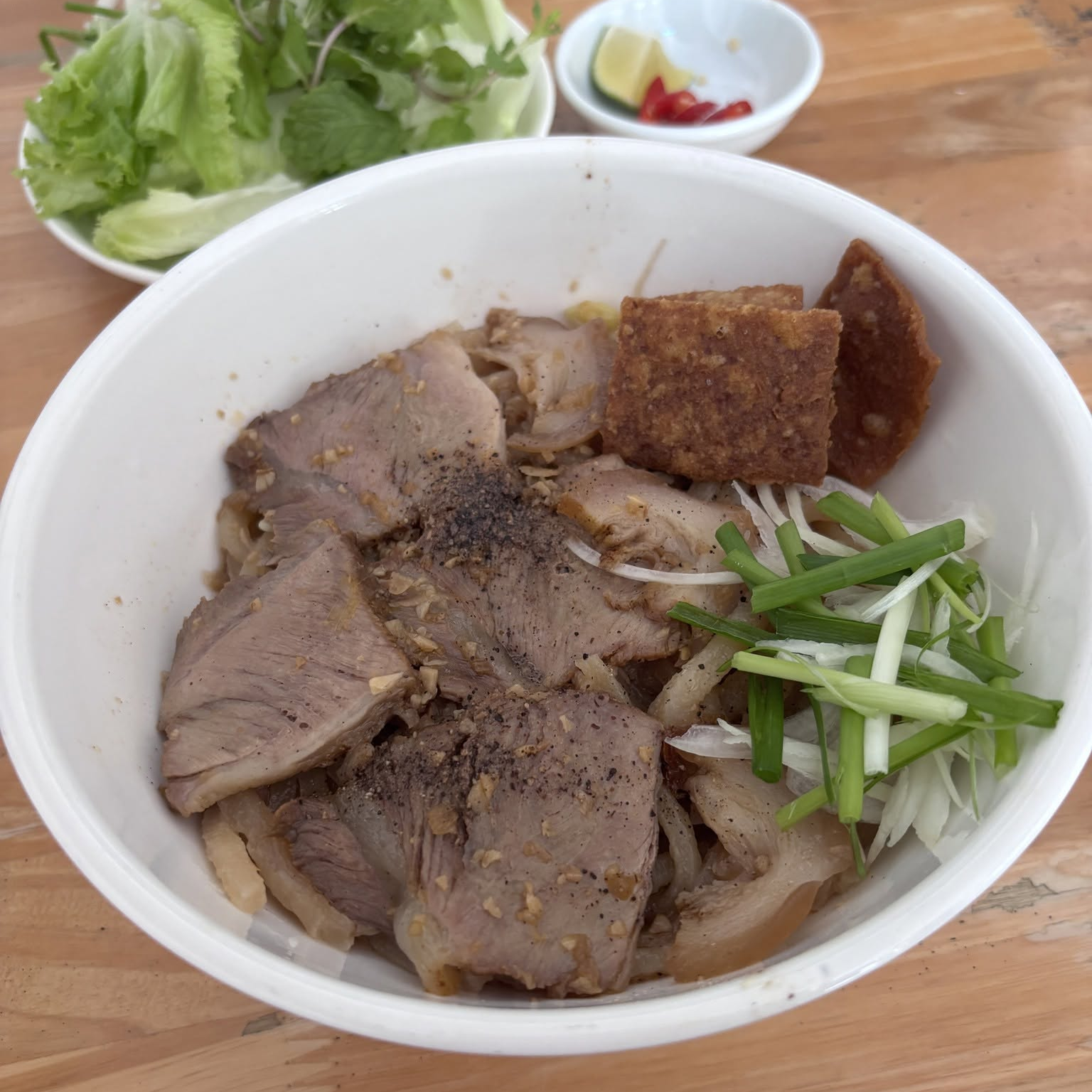 Cao Lau noodles at the family-run restaurant on Dao Duy Tu Street