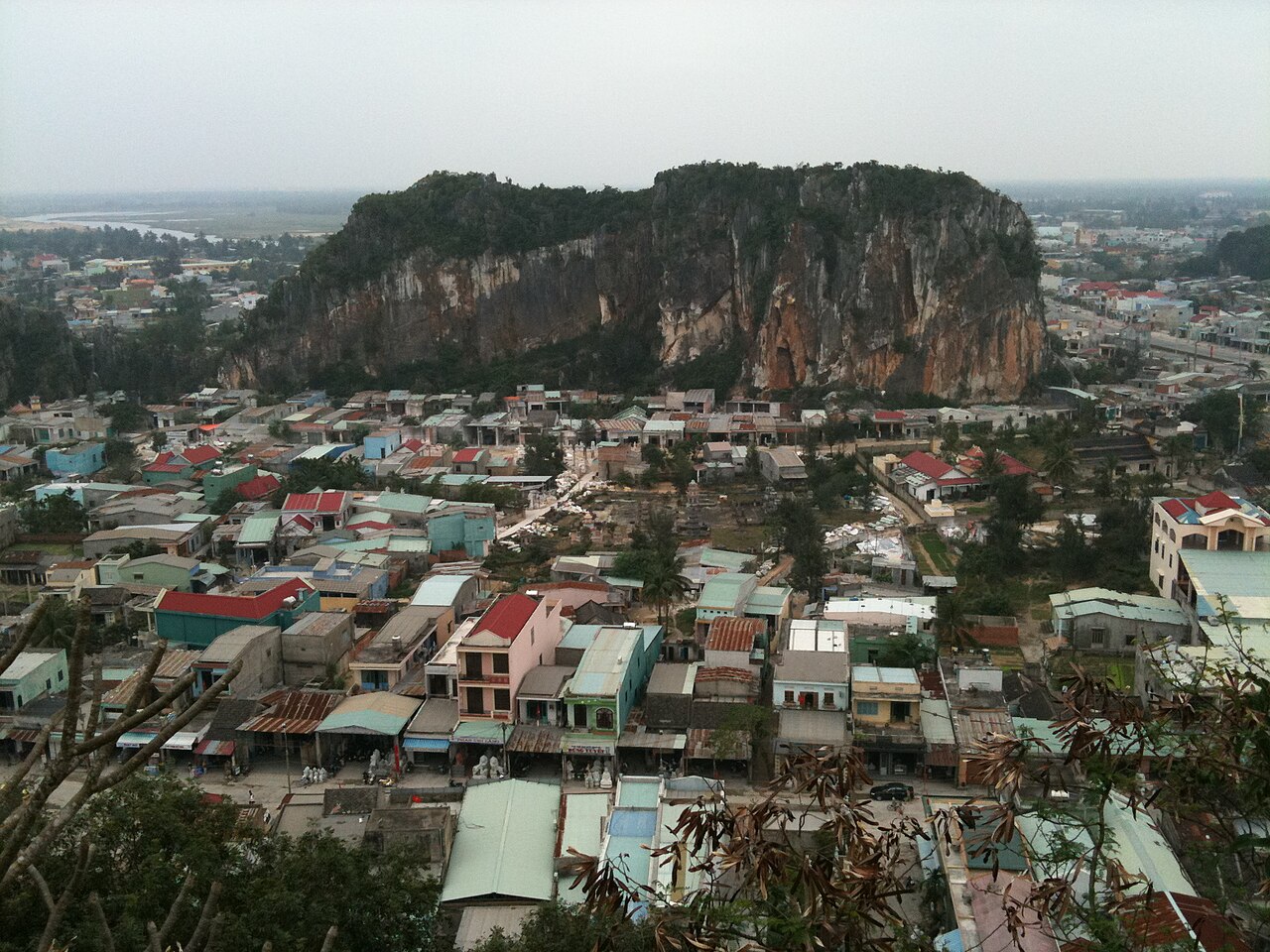 Marble Mountains rising above Da Nang